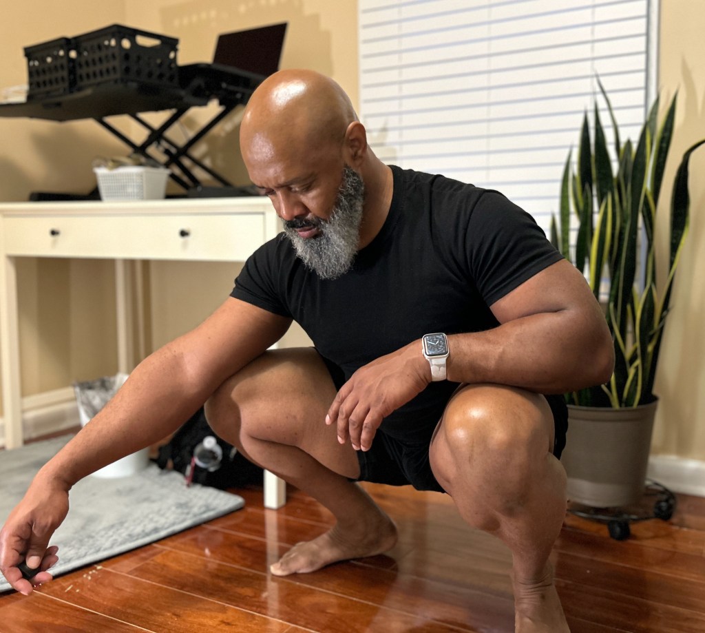Over 40 year old demonstrating the Asian squat