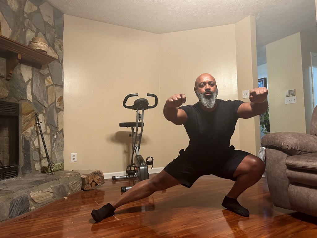 Cossack Squat left down position