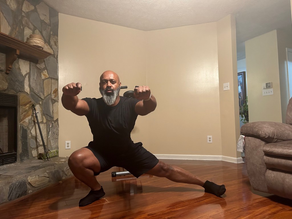 Cossack Squat to the right down position